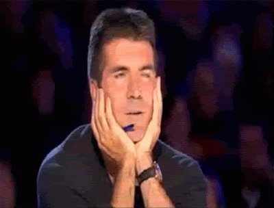 simon-cowell-happpy-the-x-factor-happy-sigh.gif